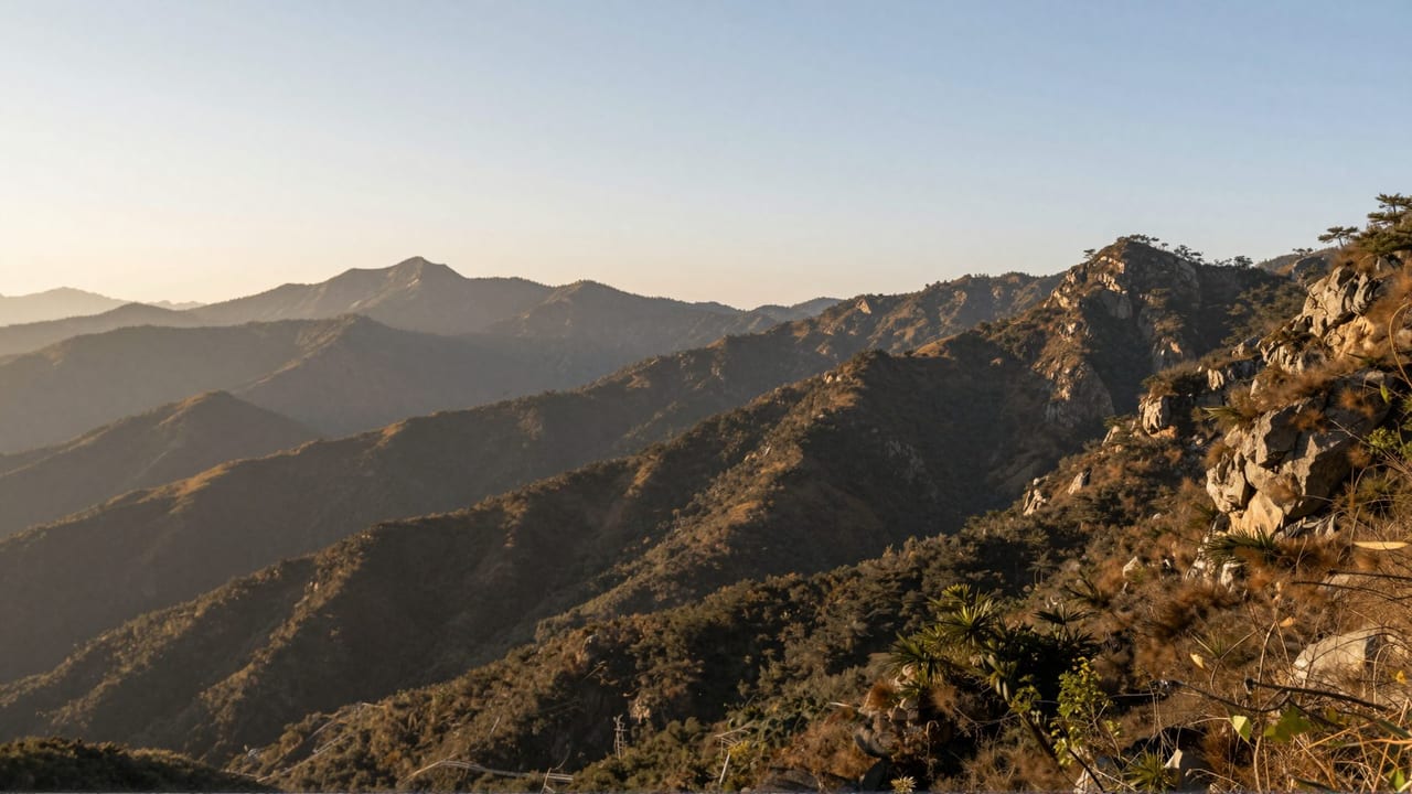 A crisp, high-definition mountain landscape — the kind of sharp detail AI enhancement restores to blurry footage
