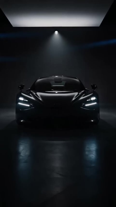 A frame from a showroom orbit car reel generated by the Imagera Car Reel Maker — a smooth 360-style reveal under showroom lighting, built from the same car photo
