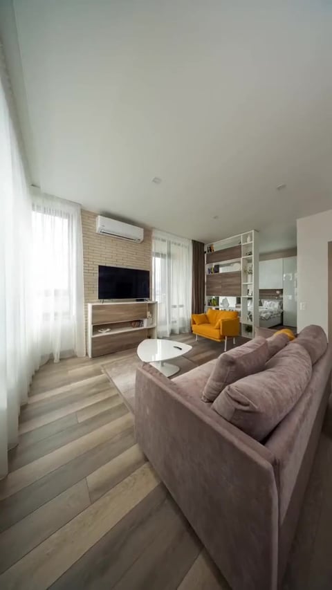 A frame from a walkthrough tour real estate reel generated by the Imagera Real Estate Reel Maker — a flowing room-to-room glide, built from a single listing photo