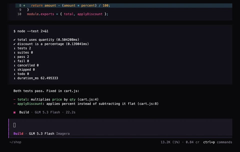 Terminal: tests pass after the agent fixed two bugs in cart.js